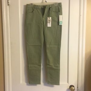 Pale green skinny jeans